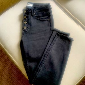 Black Rinsed Mid/High-Rise Skinny Jeans with Raw Hem at ankle